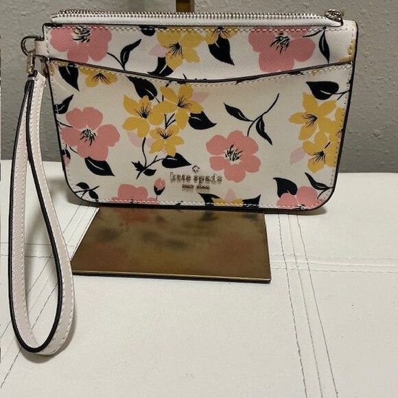 kate spade Handbags - Kate Spade White Floral Zip Top Wristlet Outside Pocket